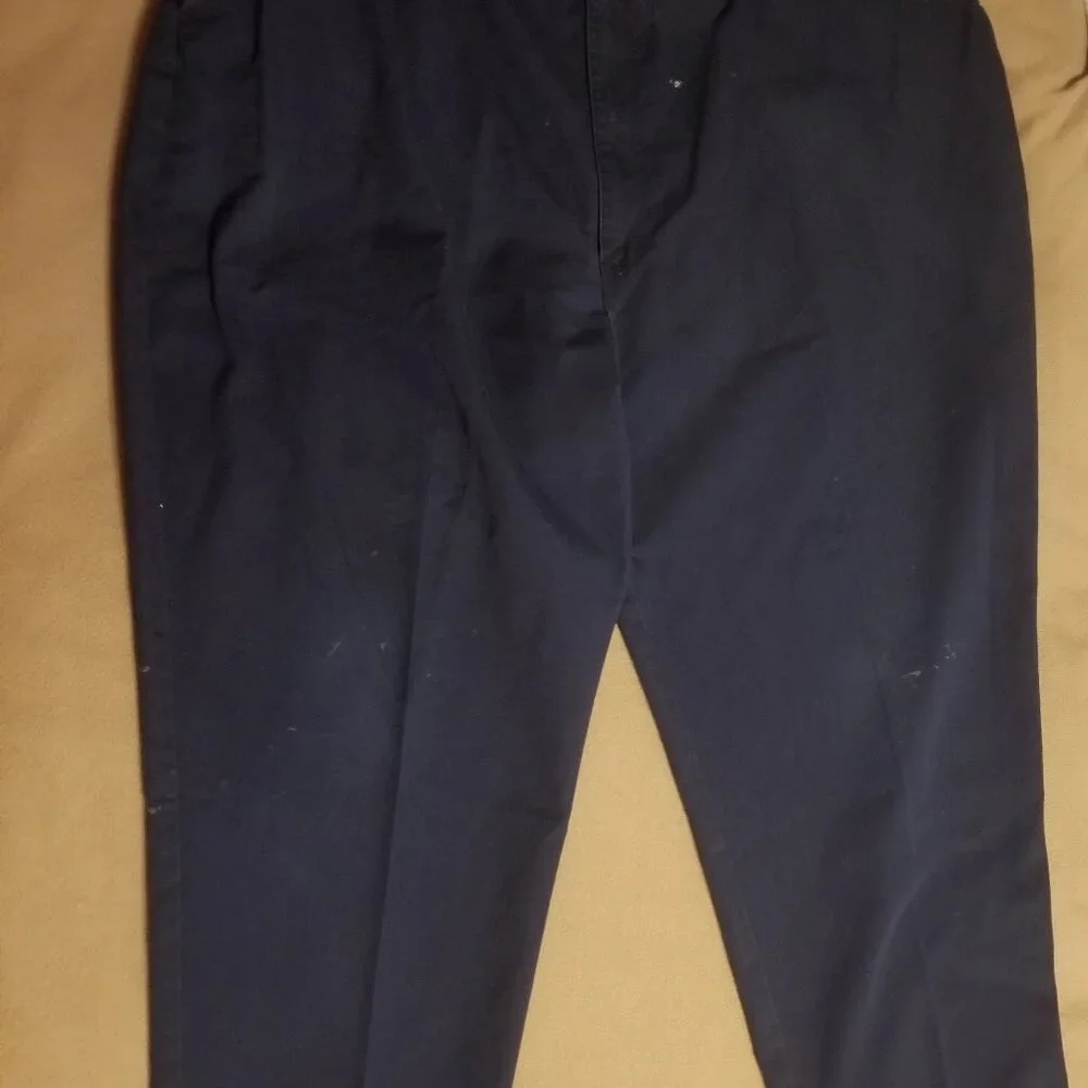 Three stained Cintas men's pants with stretching waistbands